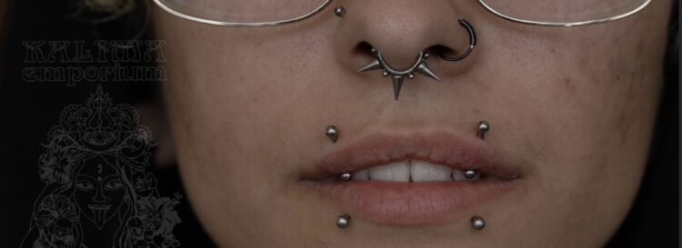 Unique paired vertical upper lip piercings